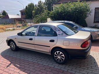 MAZDA 323 - 4