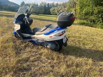 Suzuki burgman - 4