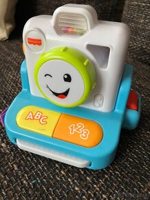 Fisher-Price Upokojujúca vydra s melódiami a fotoaparát - 4
