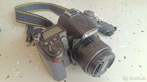 Predám fotoaparát Nikon D7000 + objektív 50mm - 4