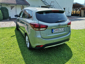 Kia Carens - 4