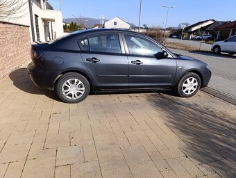 Mazda 3 sedan - 4