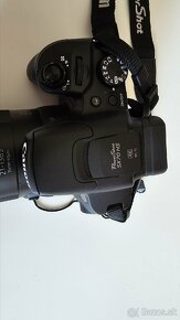 CANON Powershot SX 70 HS
- 4