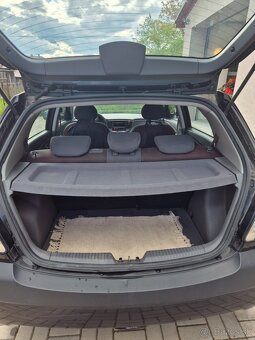 Kia rio - 4