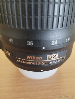 objektív Nikon 18-55+ slnečná clona - 4