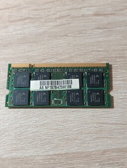 Intel Core 2 Duo T2330. (+ 1gb ddr2 ram) - 4