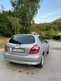 Nissan Almera N16 hatchback - 4