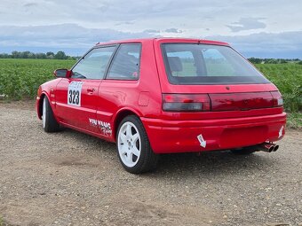 Mazda 323 _ 1.6 - 4
