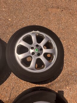 4X DISKY 16" OCTAVIA I LAURIN KLEMENT + PNEU VREDESTEIN - 4