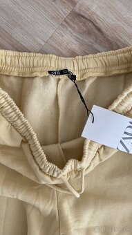 Nohavice Zara c. L - 4