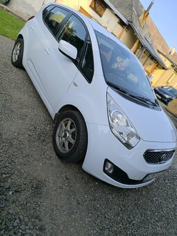 KIA VENGA - 4