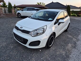 Kia rio - 4