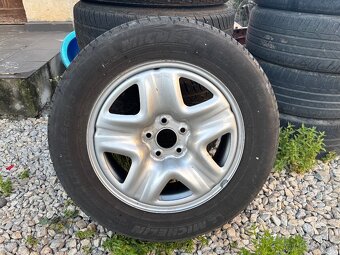 Predám originálne plechové disky MAZDA +rezerva - 4