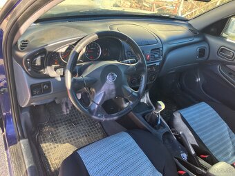 Nissan Almera N16 sedan, 1,5 benzín 72 kW - 4