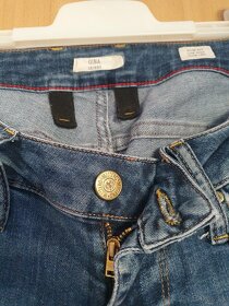 Bedrové jeansové nohavice 3 - 4