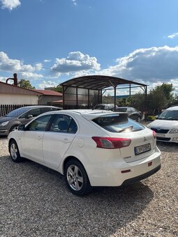 Mitsubishi Lancer 1,5 - 4