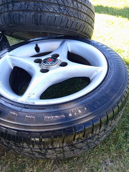 R14 4x100 - 4