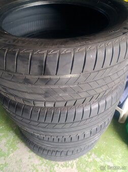 235/55/17 bridgestone dot 23 = 6,5mm - 4