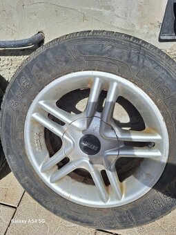 Predám 4ks elektrónov z Kia Rio 2 - 185/65 R14 - 4