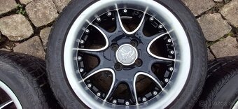 Keskin 4x100 R15 + Bridgestone 195/50R15 - 4