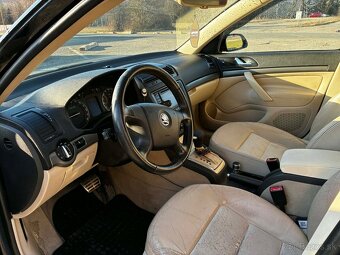 Octavia 1,9 77kw DSG automat - 4