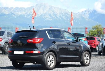 Kia Sportage - benzín - 4