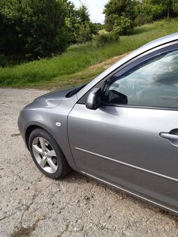 Mazda 3 - 4