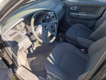 Kia carens crdi - 4