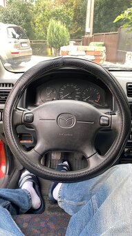 Mazda 323 - 4