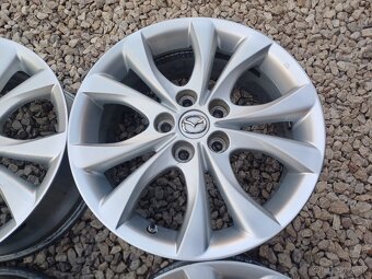 hlinikové disky org.Mazda 3,---7Jx17-ET-52,5---5x114,3 - 4
