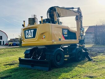 Kolesové rypadlo Caterpillar M316F - 4