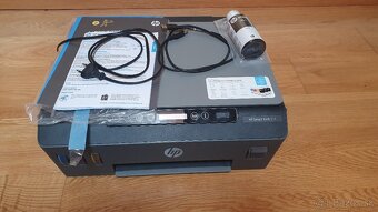 Tlačiareň HP - 4