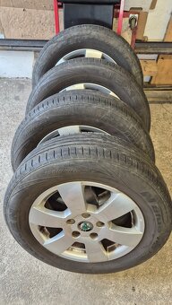 195/65R15 Hliníkové disky Octavia 2 - 4