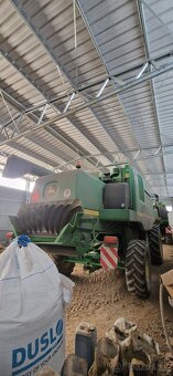 John Deere W540c, Postrekovač John Deere 740 - 4