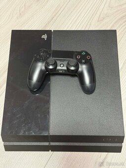 PS4 1TB - 4
