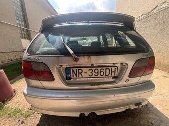 predam nissan almera - 4