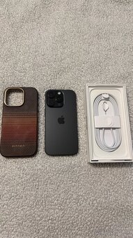 iPhone 16 pro 128gb Black Titanium - 4