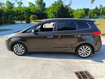 Kia carens - 4