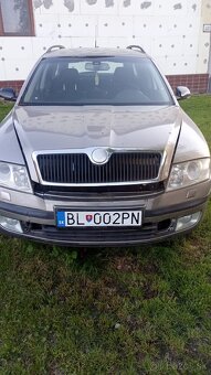 Rozpredám Škoda Octavia Combi 2.0 103kw  DSG - 4