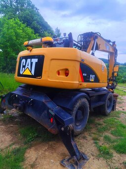 Caterpillar M313D kolesový bager - 4