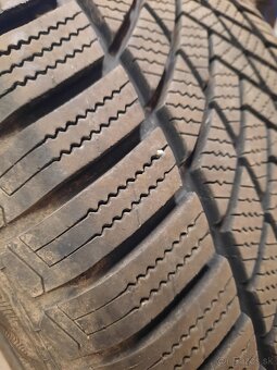 235/55R18 - 4