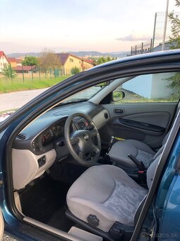Nissan Almera n16 2002 1.5 66kw - 4