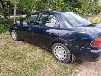 Mazda 323 - 4