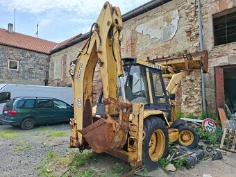 CATERPILLAR 428B 4X4 - 4