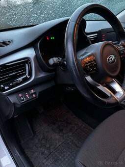 Kia rio - 4