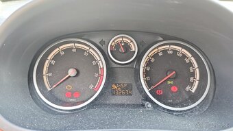 Opel Corsa D 1.2Ecotec - 4