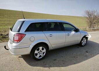 Astra caravan H 1.9CDTi 74kw 111jahre - 4