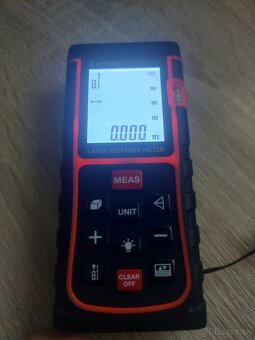 Laserorový diaľkomer (disto) značky Extol - 4