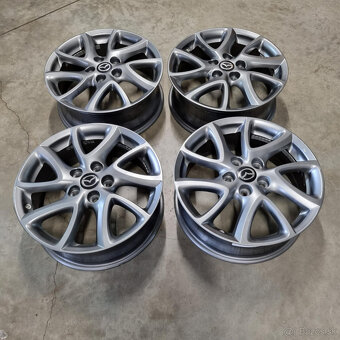 Mazda disky 5x114,3 R17 6,5J ET52,5 - 4