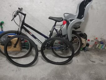 Horský bicykel z detskou sedačkou. - 4